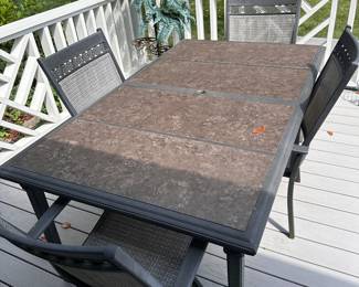 Solid outdoor patio table with 4 chairs