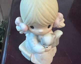 Precious Moments figurine titled "Scent From Above". 