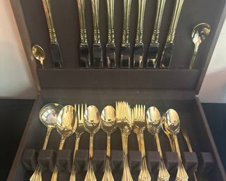 Gold cutlery in a case