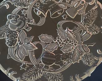 Mikasa Festive Spirit Round Hostess Platter, a clear glass serving platter with etched Christmas-themed designs.