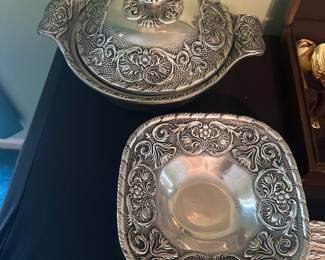 A lidded tureen and a square serving bowl. 