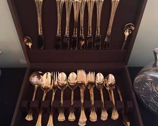 Gold cutlery in a case