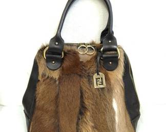 These authentic designer purses and accessories are brought to you by Kandys lux .(615) 542-3068