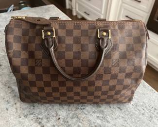 These authentic designer purses and accessories are brought to you by Kandys lux .(615) 542-3068