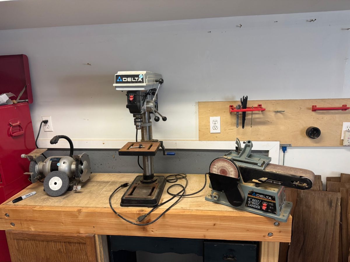 Grinder, drill press, and sander, all working and in good condition.