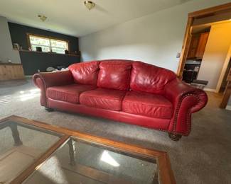 Same couch. The glass-topped coffee table is also available.