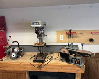 Grinder, drill press, and sander, all working and in good condition.