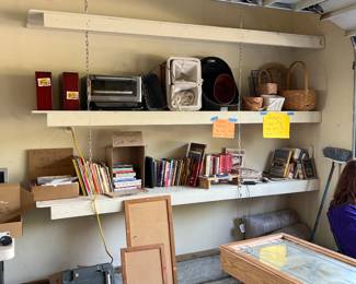 Books, stationary, cards, office supplies, baskets, and Cuisinart toaster oven.