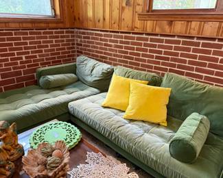 Contemporary green velvet sofa