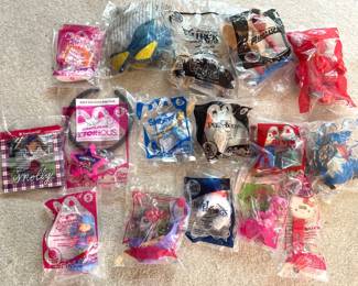 Huge Collection McDonalds Happy Meal toys in packages: Hello Kitty, Disney, Smurfs, American Girl, Nickelodeon, Avengers Marvel