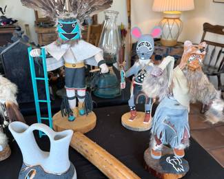 Southwest art: Kachinas (eagle, antelope, mouse, crow mother) including wooden piece from J. Guy; sandpaintings, Pueblo pottery, ceremonial staffs, bows + arrows