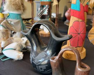 Southwest art: Kachinas (eagle, antelope, mouse, crow mother) including wooden piece from J. Guy; sandpaintings, Pueblo pottery, ceremonial staffs, bows + arrows