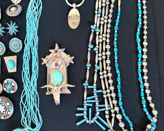Large assortment of Native American jewelry: necklaces, pendants, bracelets, rings, earrings (mostly clip on)