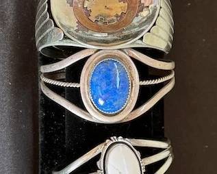 Large assortment of Native American jewelry: necklaces, pendants, bracelets, rings, earrings (mostly clip on)
