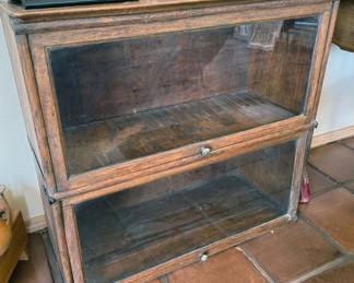 Bookcase with flip-up glass doors
