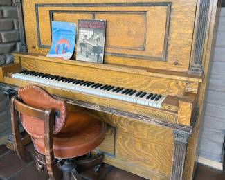 Upright Colby piano in zebra wood veneer