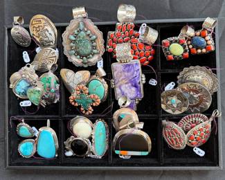 Large assortment of Native American jewelry: necklaces, pendants, bracelets, rings, earrings (mostly clip on)
