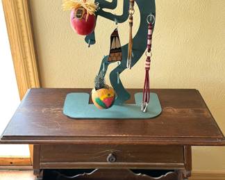 Modern kokopelli display stand