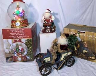Huge Light Up Musical Holiday Globe With Decorative Santas