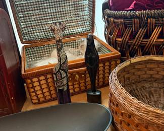 Picnic basket with dishes.