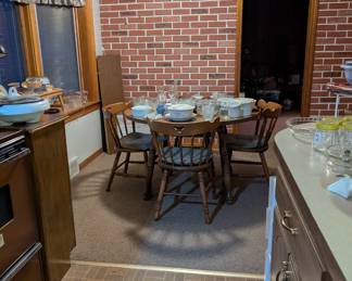 dining table with 4 chairs and 2 insert leaves