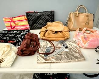 Purses and bags including Michael Kors, Coach, Vera Bradley, and others