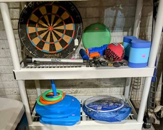 Dart Board and pool floats, toys and games