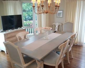 Elegant dining table and chairs by Ethan Allen seats 8; chandelier