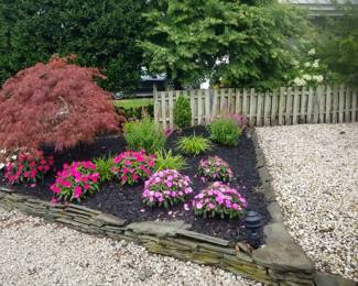 Stacked slate; annuals & perennials; Japanese maple