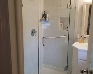 Glass shower surround