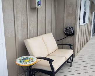 Custom patio table imported from Italy; glider