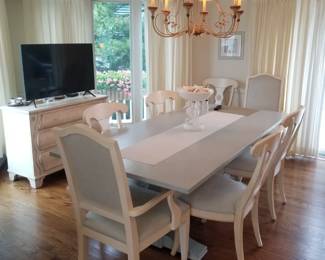 Elegant dining table and chairs by Ethan Allen seats 8