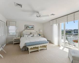 King bedroom suite by Ethan Allen: king bed; two nightstands; bench; 9-drawer dresser