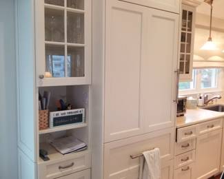 Kitchen cabinetry detail; Sub-Zero 736TC refrigerator with two-drawer freezer; ASKO dishwasher with stainless steel interior