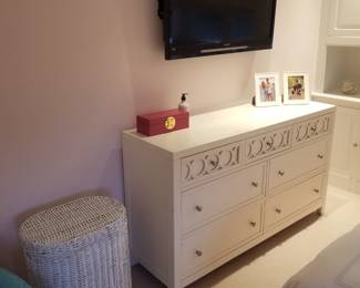 7-drawer dresser; hamper; flat screen TV with wall mount. Dresser has a matching nightstand