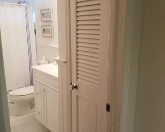 Louvered door