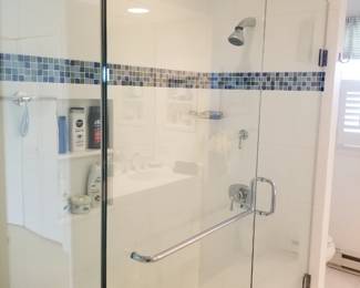 Glass shower surround