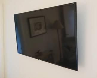 Flat screen TV with wall mount