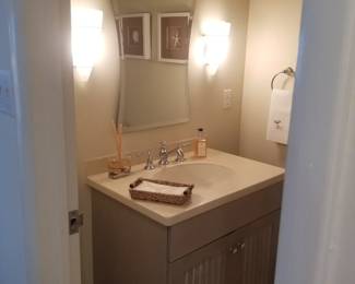 Bath vanity; vanity mirror; wall sconces