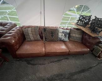 Leather couch and throw pillows