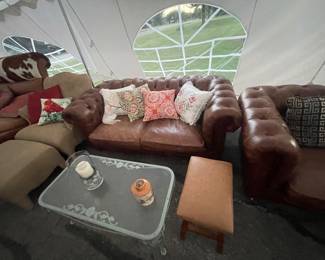 Leather couches outside glass table