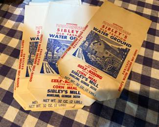 Corn meal Bags … Moreland,Ga… plenty of these in stock. See next photo. Garage