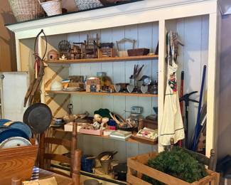 Large Display Shelving. It is a solid piece. No wheels are attached to it but it is sitting on rollers that go with the shelving for easy transport