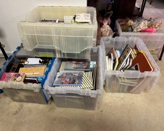Totes upon totes of notebooks, pretty writing pads, stationary