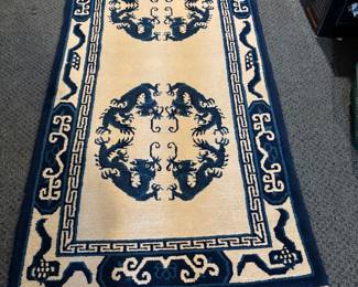 Hand woven Wool Rug by woman in a Dalai Lama Tibetan exile colony in Chandragiri Village, Orissa State, India. About 1980