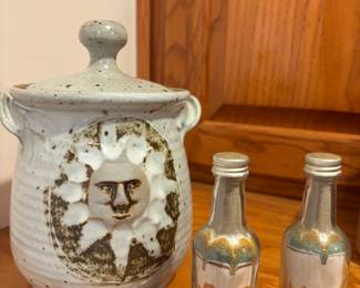 Signed Potter with face and lid and handles