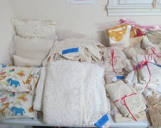 Nice selection of fine linens, lace, towels, curtains, vintage items, handmade items, quilts, blankets, throws, afghans, and more!