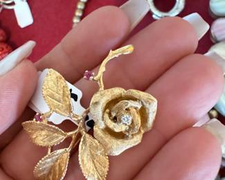 The cutest gold and tiny diamond and ruby brooch ever!