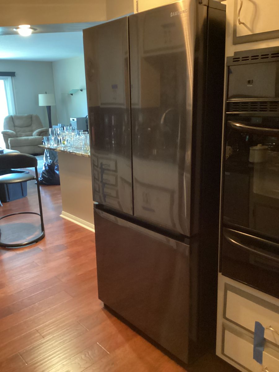 Samsung refrigerator with a two level freezer and double doors. Price: