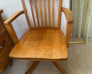 Vintage wood rolling swivel desk chair